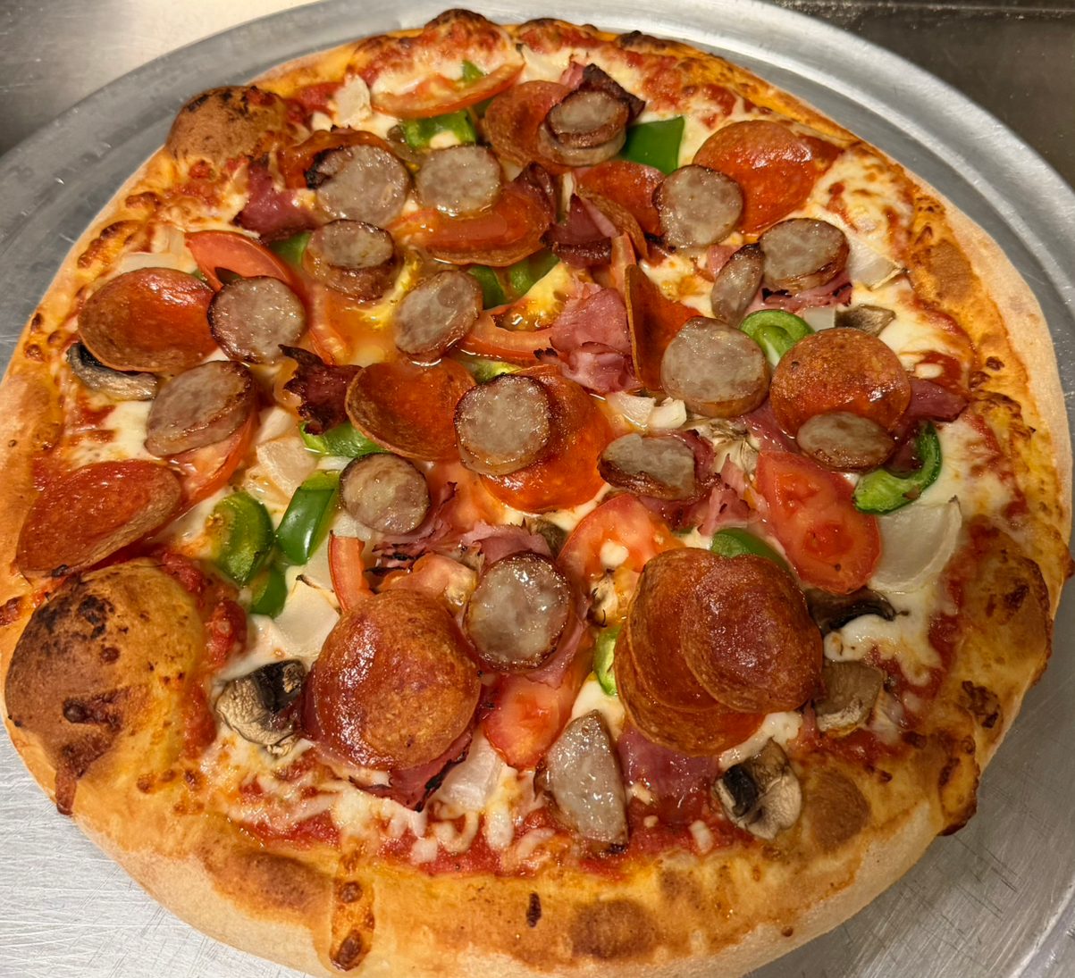 The Deluxe Pizza.